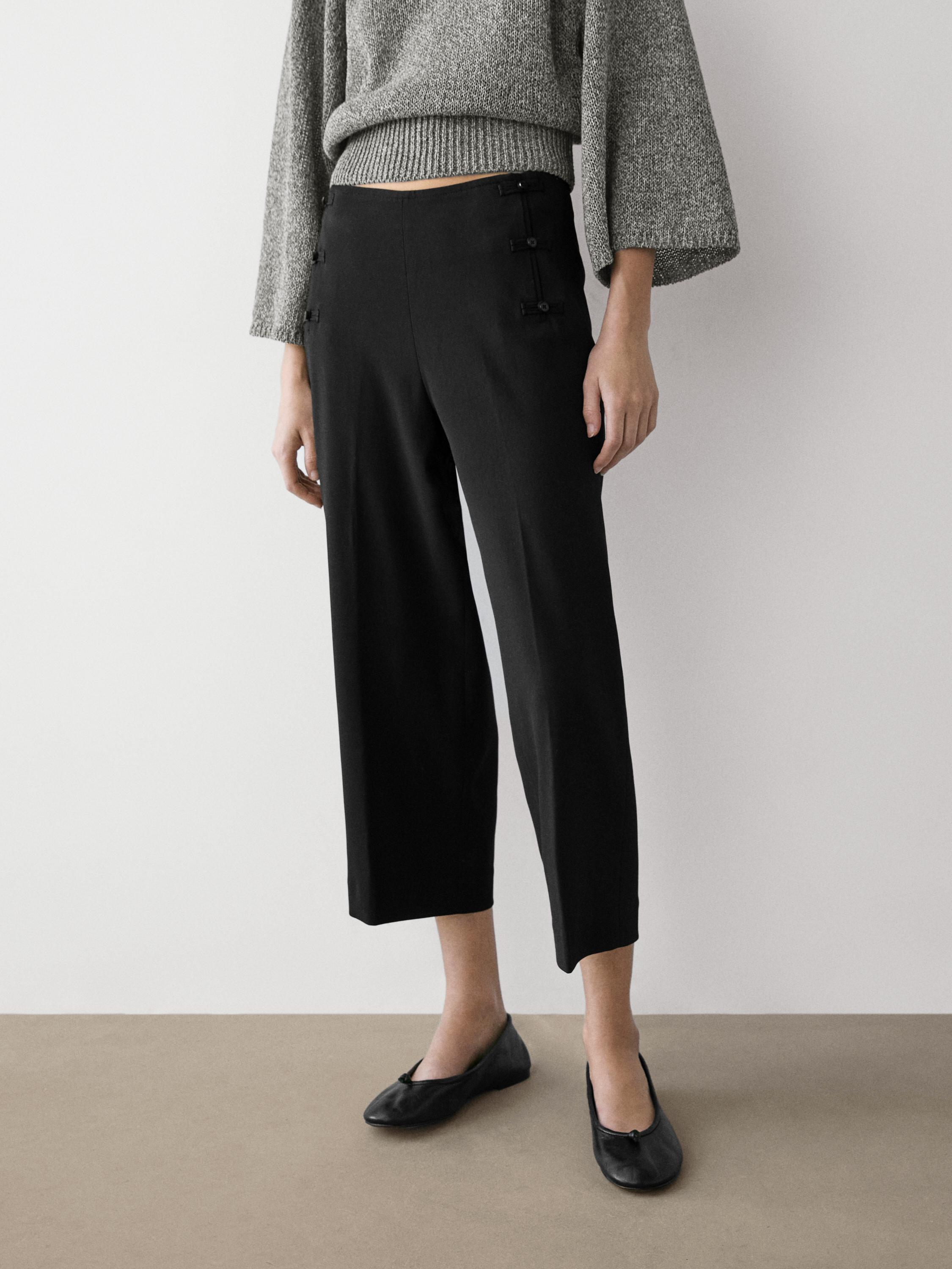 Pantalon capri avec boutons